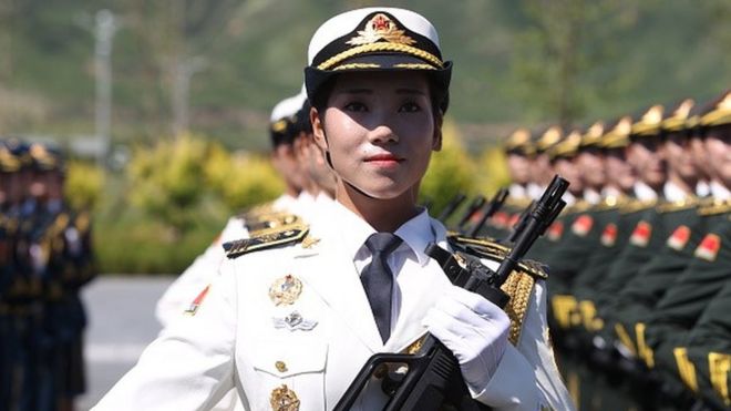 A female soldier from the Chinese People's Liberation Army attends a training session for the September 3 military parade to mark the 70th anniversary of the victory of the Chinese People's War of Resistance Against Japanese Aggression at a military base on August 22, 2015 in Beijing, China.