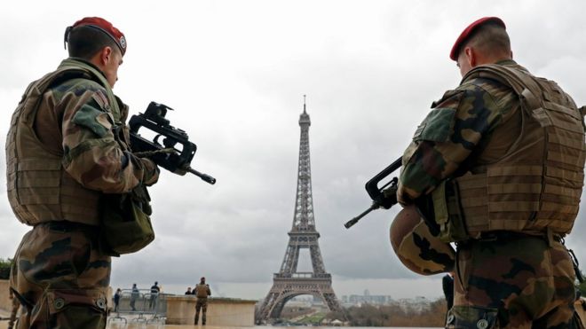 French army paratroopers patrol near the Eiffel tower in Paris, France, March 30, 2016