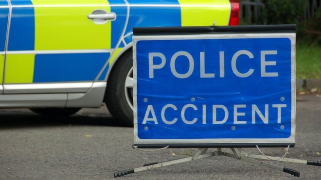 Police accident sign and vehicle