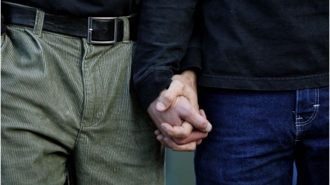 Gay couple holding hands in New York in 2006