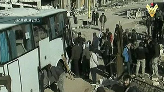 Images on Lebanon's Al Manar TV showing people boarding the buses