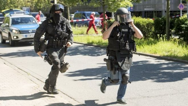 Heavily armed police outside a movie theatre complex where an armed man has reportedly opened fire on June 23, 2016 in Viernheim, Germany
