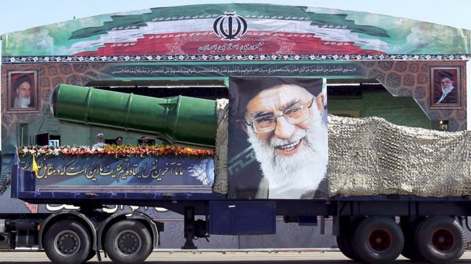 A military truck carrying a missile and a picture of Iran's Supreme Leader Ayatollah Ali Khamenei is seen during a parade marking the anniversary of the Iran-Iraq war (1980-88) in Tehran on 22 September 2015