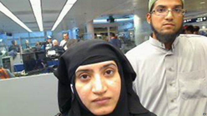 Tashfeen Malik and Syed Farook in a government photo as they passed through O'Hare International Airport