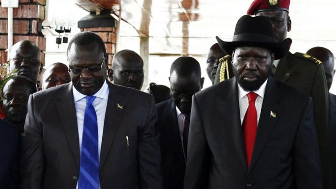 South Sudan's then Vice-President Riek Machar (L) and President Salva Kiir on the 2nd anniversary of independence (file photo - July 2013)