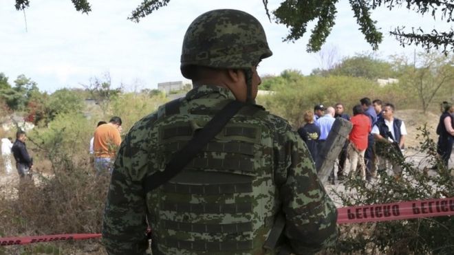 Mexican soldier guards the area where Gisele Mota was killed