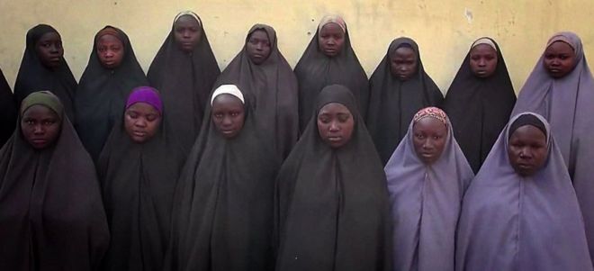 This video grab made on April 14, 2016 from a video obtained via a CNN footage that the Nigerian government has said is a "proof of life" video being studied, that shows some of the more than 200 schoolgirls abducted by Boko Haram