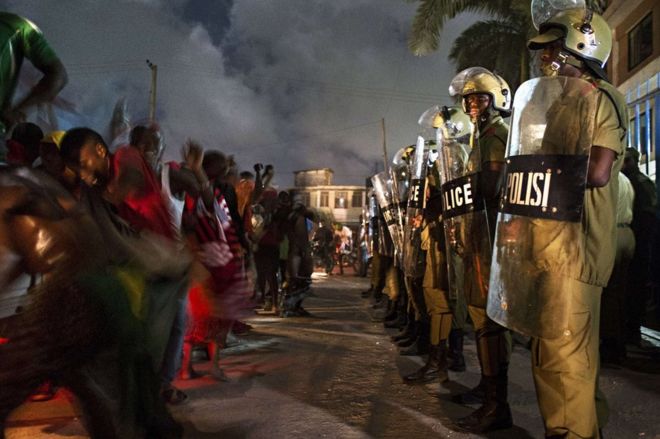 Tanzanian riot police stand guard in Dar es Salaam