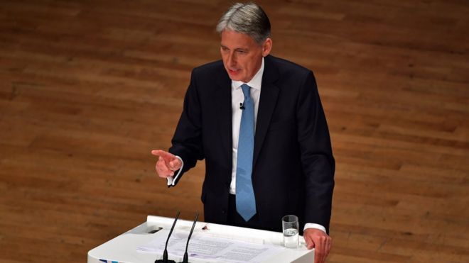 Chancellor of the Exchequer, Philip Hammond, delivers a speech about the economy on the second day of the Conservative Party Conference 2016 at the ICC Birmingham on October 3, 2016 in Birmingham, England.