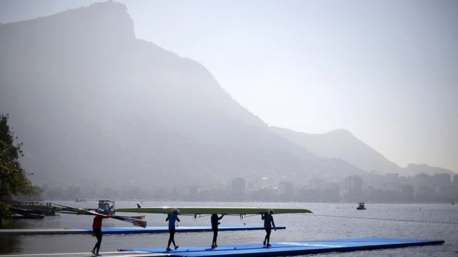 Athletes carry a scull towards training, Lagoa Stadium - Rio De Janeiro, Brazil