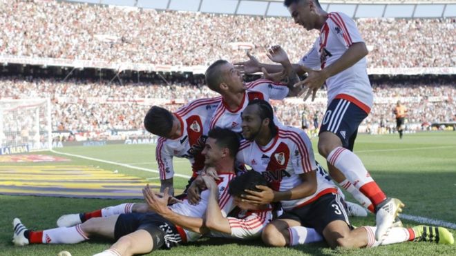 River Plate's forward Lucas Alario, left, celebrates scoring against Boca Juniors