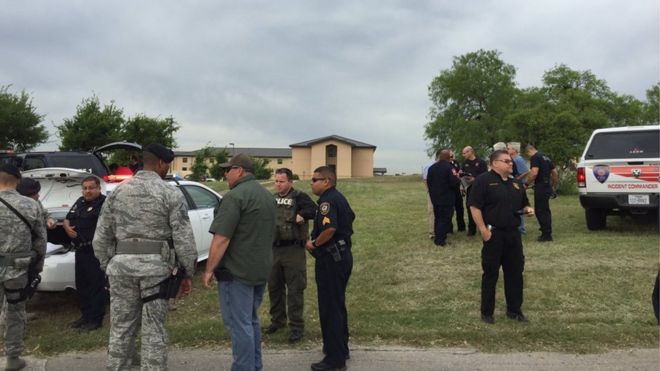 Police respond to the shooting at Lackland