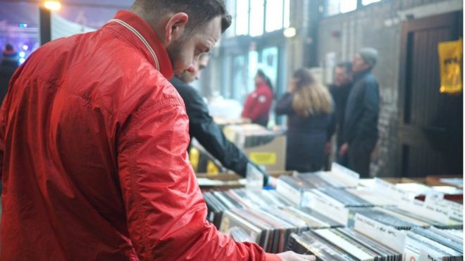 A man browses records in The Boiler Shop record store in Newcastle