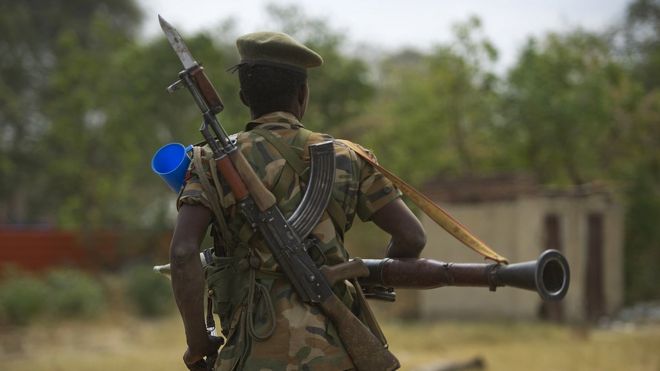 South Sudanese People Liberation Army (SPLA) soldier patrols in Malakal on 21 January 2014.