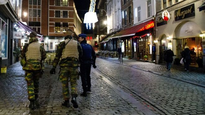 Police patrol near the Grand Place in the center of Brussels