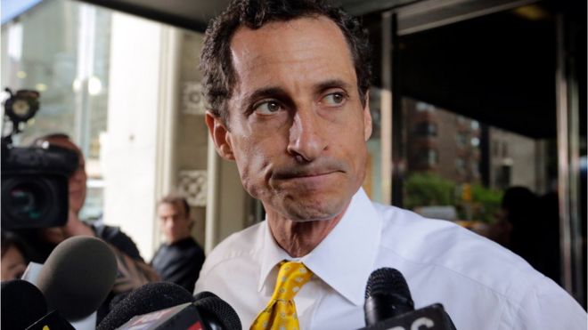 In this July 24, 2013 file photo, former New York Rep. Anthony Weiner leaves his apartment building in New York.