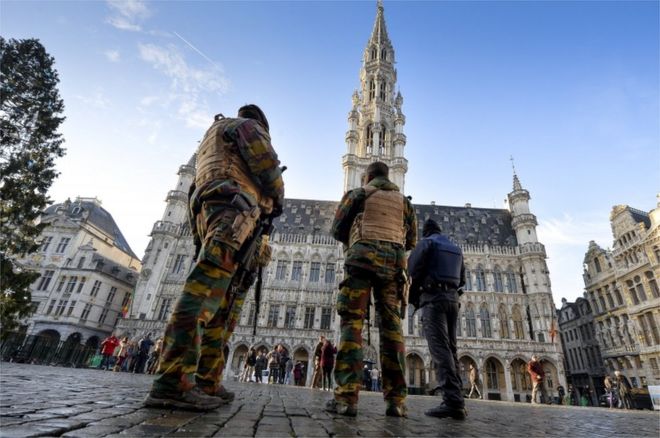 Soldiers and police patrol on Brussels' Grand Place 23 November 2015