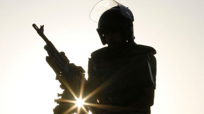 Armed Egyptian soldier in silhouette, 2011