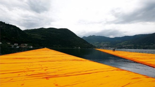 view from the art installation The Floating Piers by Bulgarian-born artist known as Christo on Lake Iseo, northern Italy,