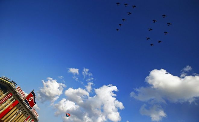 Planes pictured forming the figure 70 in the sky during the military parade for the 70th anniversary of the founding Workers' Party, Pyongyang, North Korea - Saturday 10 October 2015