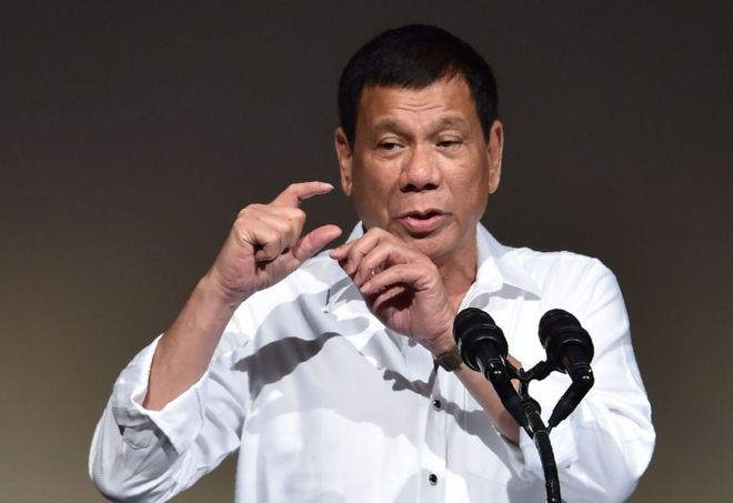 Philippines" President Rodrigo Duterte delivers a speech at the Philippines Economic Forum in Tokyo on October 26, 2016.