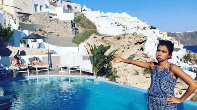 Huma Mobin by the pool in Santorini, Greece