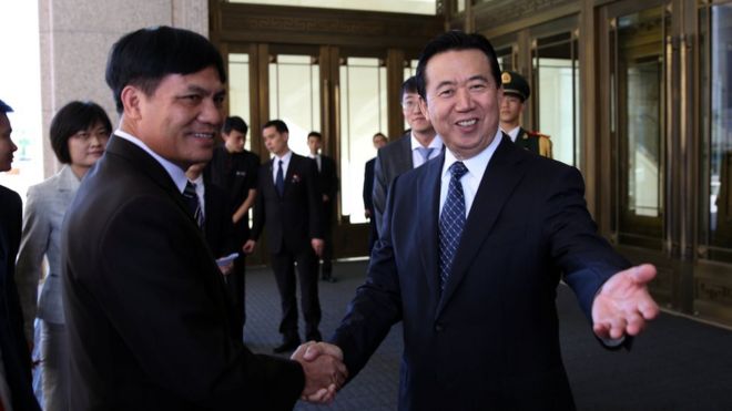 Meng Hongwei (R), Chinese Vice Public Security Minister, shakes hands with Nguyen Quang Dam, the commandant of the Vietnam Coast Guard, in Beijing, China, August 26, 2016.