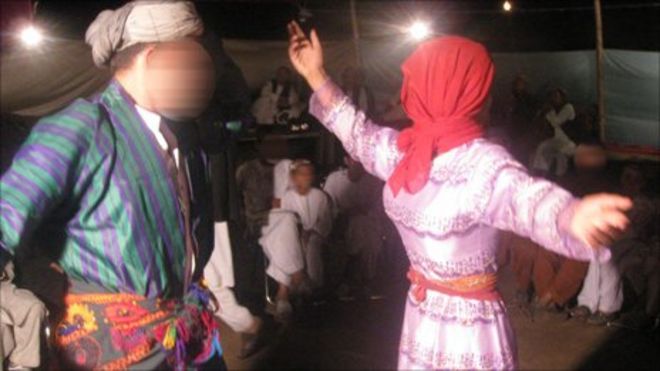 to the war torn areas of the country wearing very conservative clothing and head coverings- very different from the clothes worn throughout the country