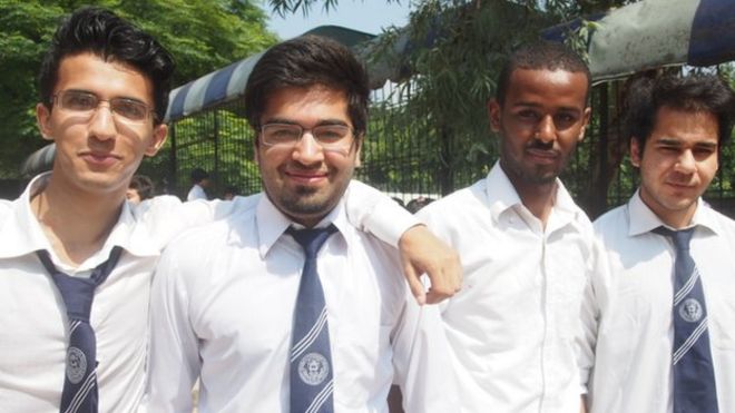 Haroon [second from left) with classmates