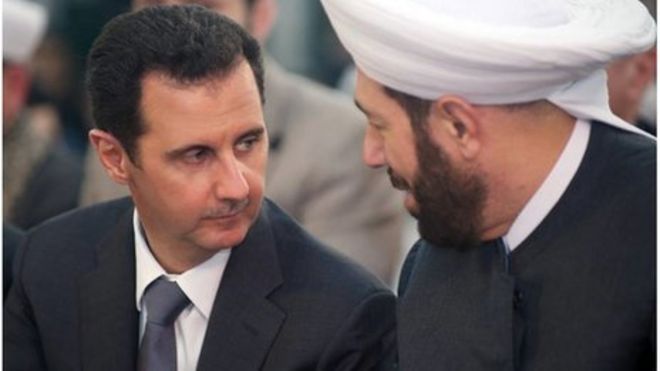 Bashar al-Assad (L) speaking with Syrian Grand Mufti Ahmed Hassun, posted - _72378494_72378493