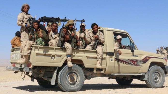 Armed tribesmen loyal to Yemen's Saudi-backed government