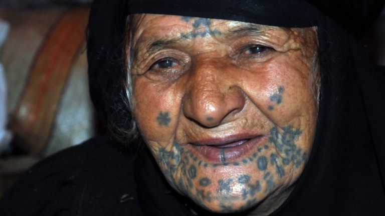 A Bedouin woman from Syria with her face tattooed