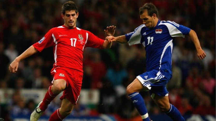 Ched Evans playing for Wales