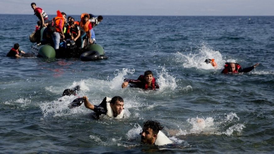 Migrants and dinghy, 20 Sept