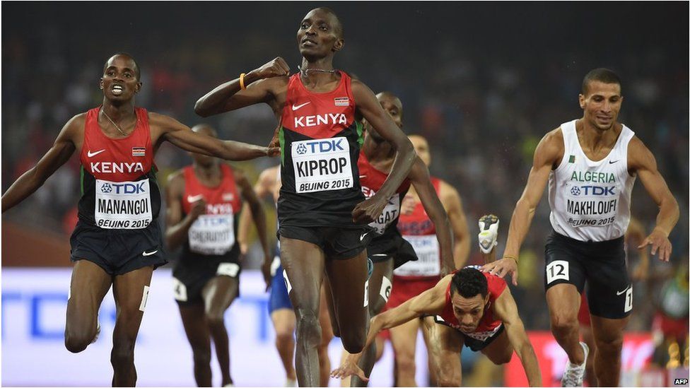 Kenya's Asbel Kiprop (centre) reacts after winning the men's 1500 metre race