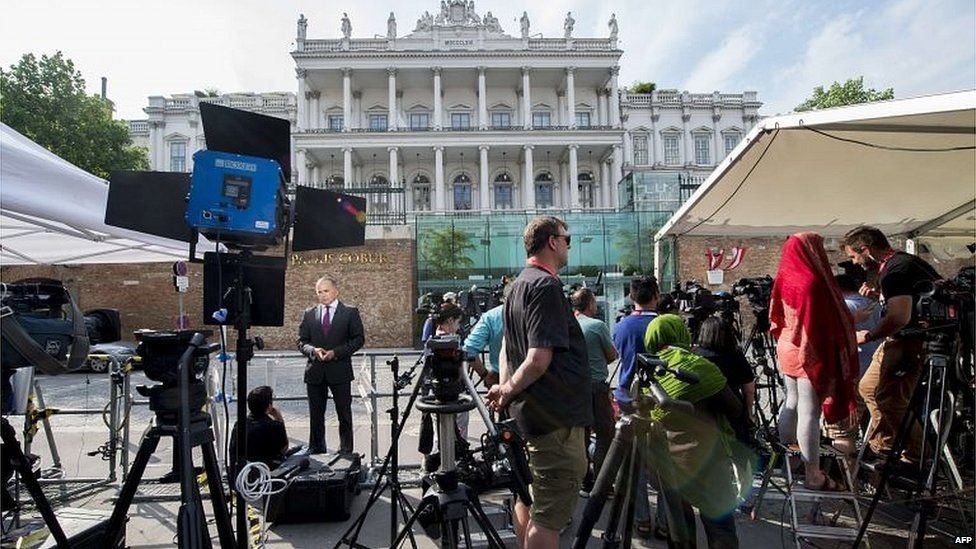 Journalists outside the Palais Coburg Hotel (12/07/15)