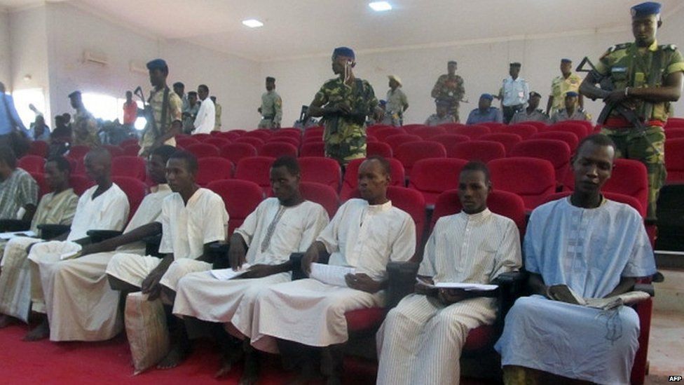members of Nigeria-based Islamist group Boko Haram sitting in court in N"Djamena, during the opening of the trial of ten suspected Boko Haram members