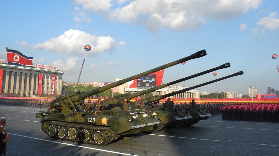 Soldiers drive heavy military equipment during the military parade for the 70th anniversary of the founding Workers' Party, Pyongyang, North Korea - Saturday 10 October 2015