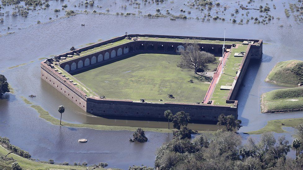 Historic Fort Pulaski National Monument is completely surrounded by flood waters in the aftermath of Hurricane Matthew on Sunday, Oct. 9, 2016, in Savannah, Ga
