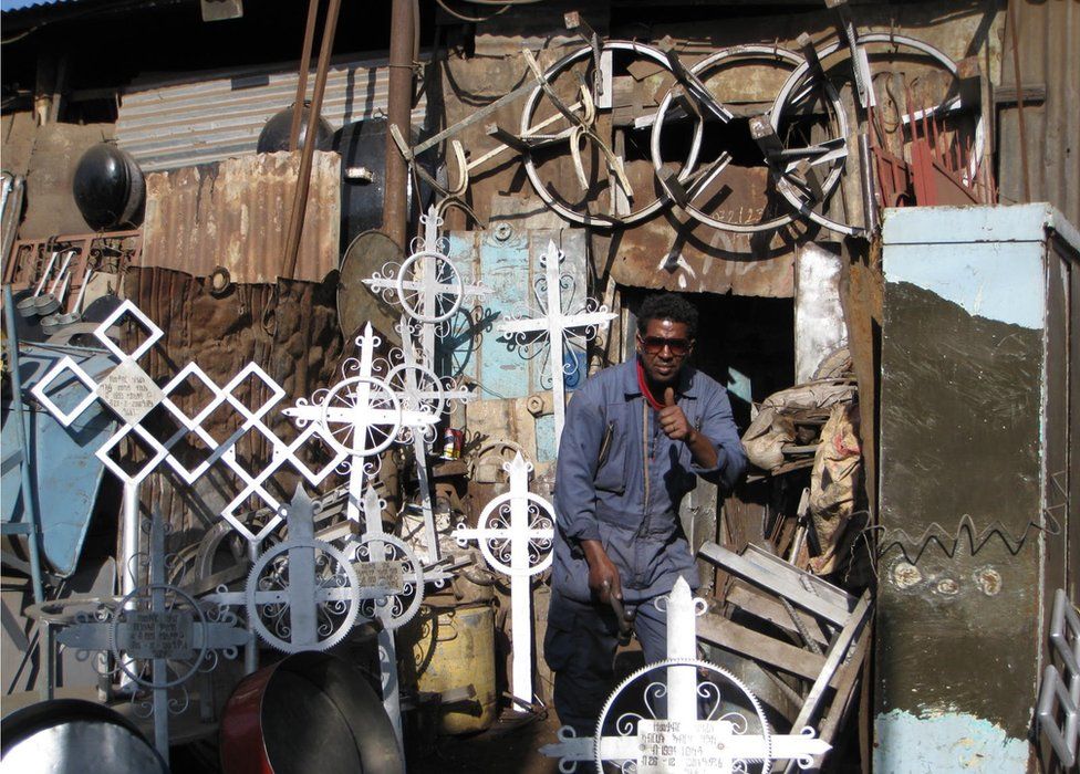 Stall selling crosses made from scraps of metal