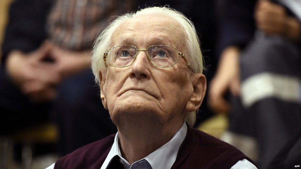Oskar Groening listens to the verdict at his trial in Lueneburg