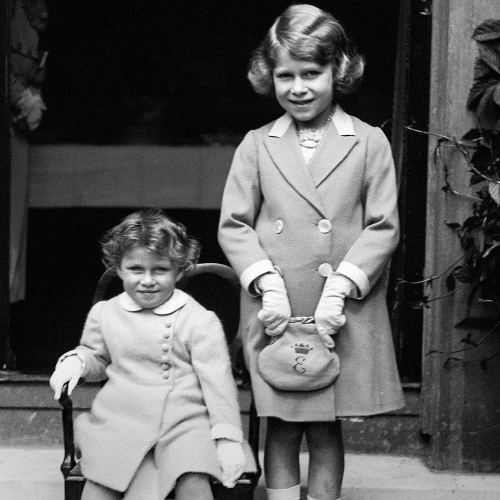 Two year old Princess Margaret (seated) with her sister Princess Elizabeth