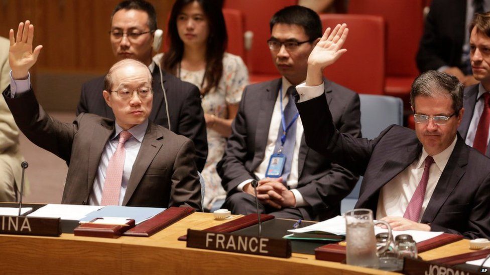 China and France's permanent representatives to the UN vote in favour of a resolution endorsing the Iranian nuclear deal (20 July 2015)