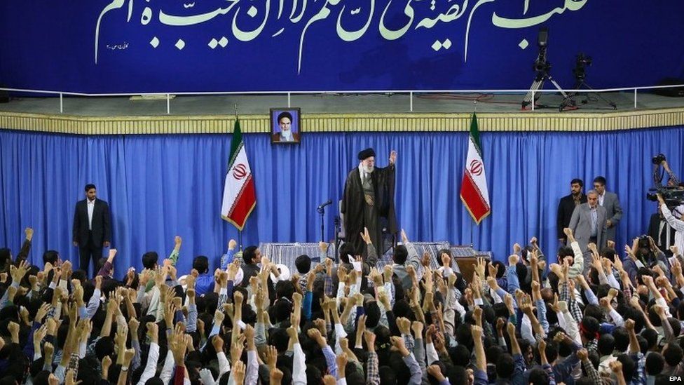 Iranian supreme leader Ayatollah Ali Khamenei (centre) greeting Iranian university students during a ceremony in Tehran (11 July 2015)