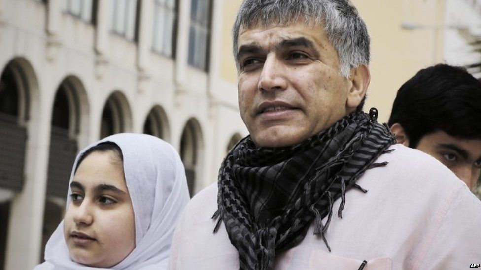 Bahraini human rights activist Nabeel Rajab and his daughter Malak (left) leave a court after attending his appeal hearing (11 February 2015)