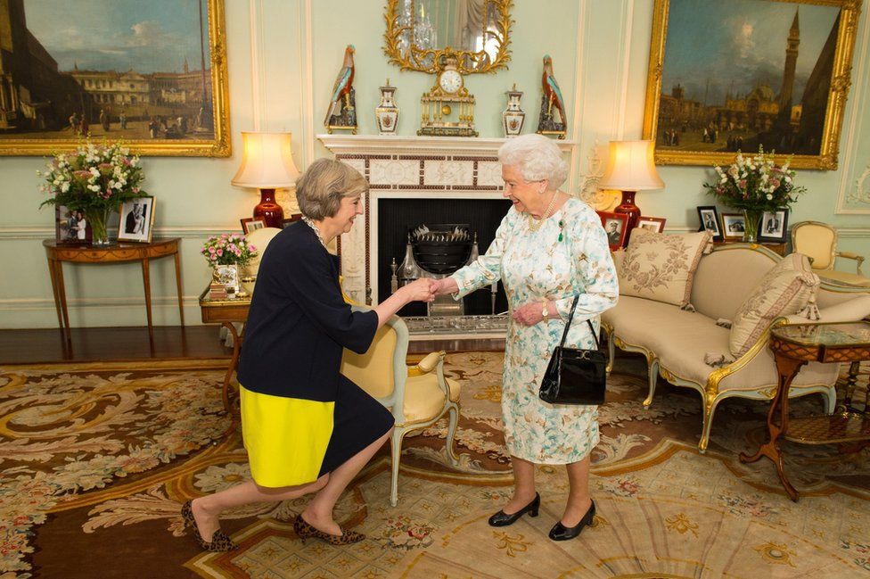 Queen Elizabeth II welcoming Theresa May