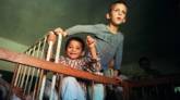 Niños huérfanos rumanos. Foto de archivo: 1990