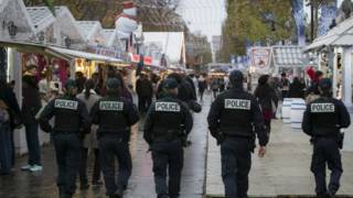 151119233411_french_police_officers_patrol_the_outdoor_christmas_market_on_the_renowned_avenue_des_champs-elysees_in_paris_640x360_epa_nocredit.jpg
