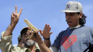 160203121604_rebelde_arma_gadafi_624x351