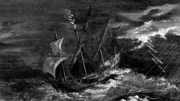 Un barco de Colón frente a un fuego de San Telmo